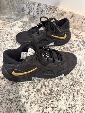 Nike Kids Black and Gold Low-Top Sneakers